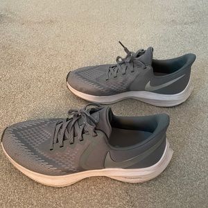 Nike gray running shoes.